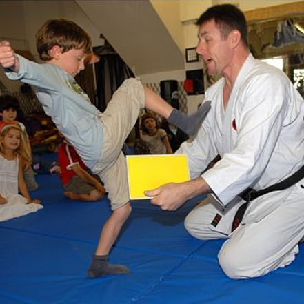 Kid Breaking Board